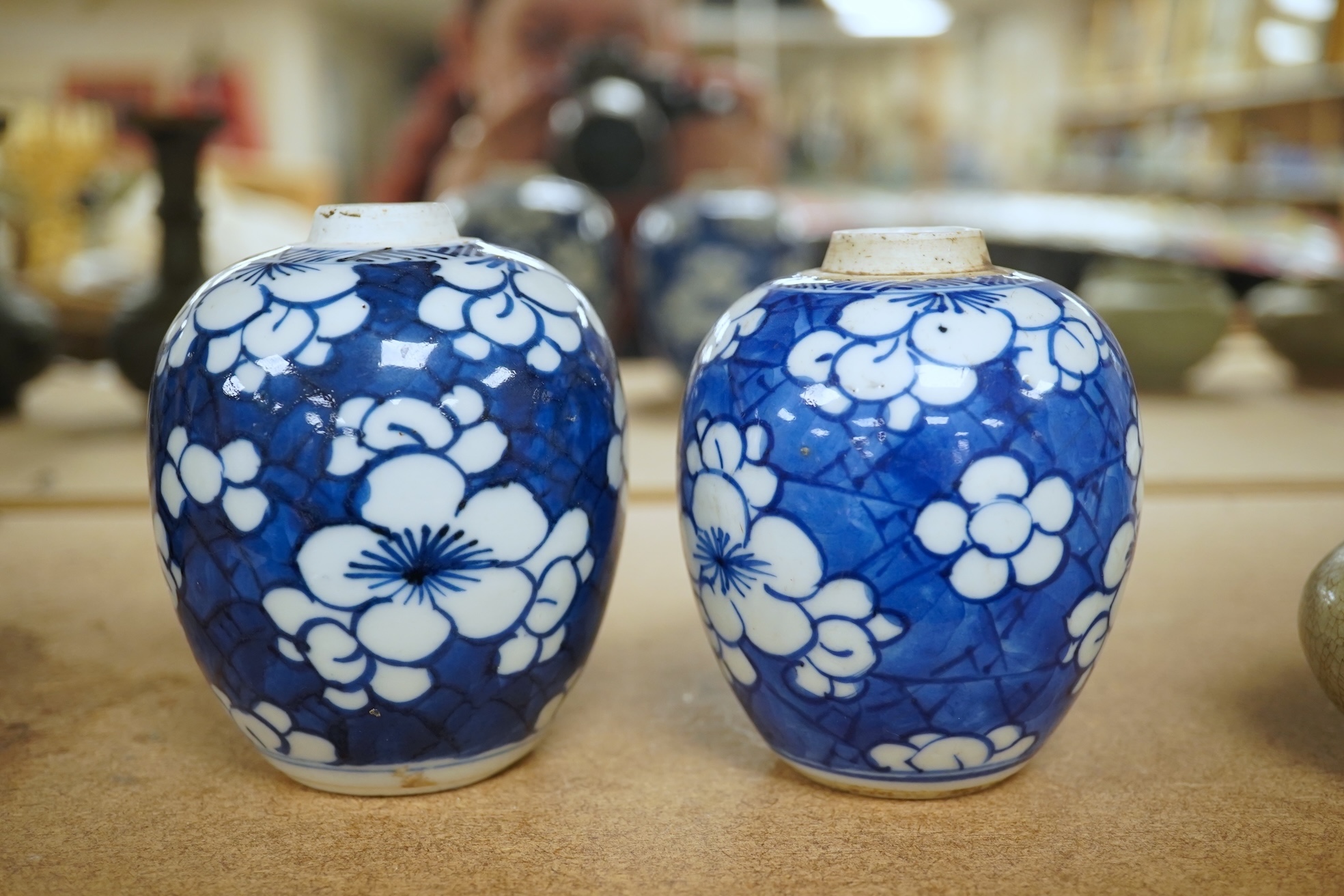 Two small Chinese blue and white prunus jars, Kangxi period, tallest 9.5cm. Condition - good